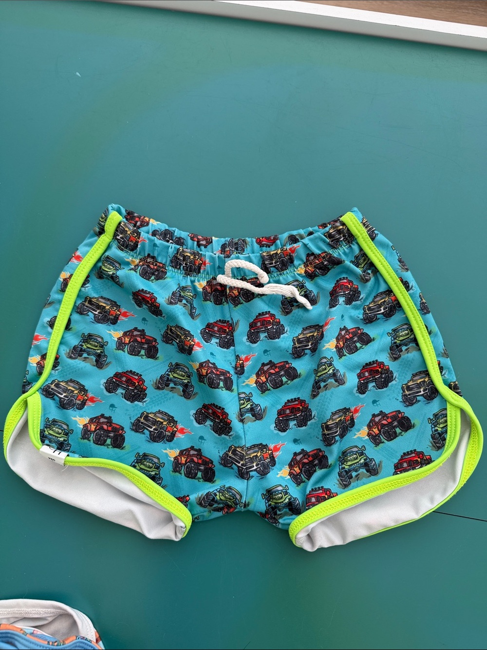 Boys Teal Monster Truck Swim Trunks with Lime Trim